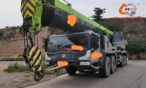 Una grúa de camión Zoomlion de 110 toneladas usada de 2023 es adecuada para la construcción
